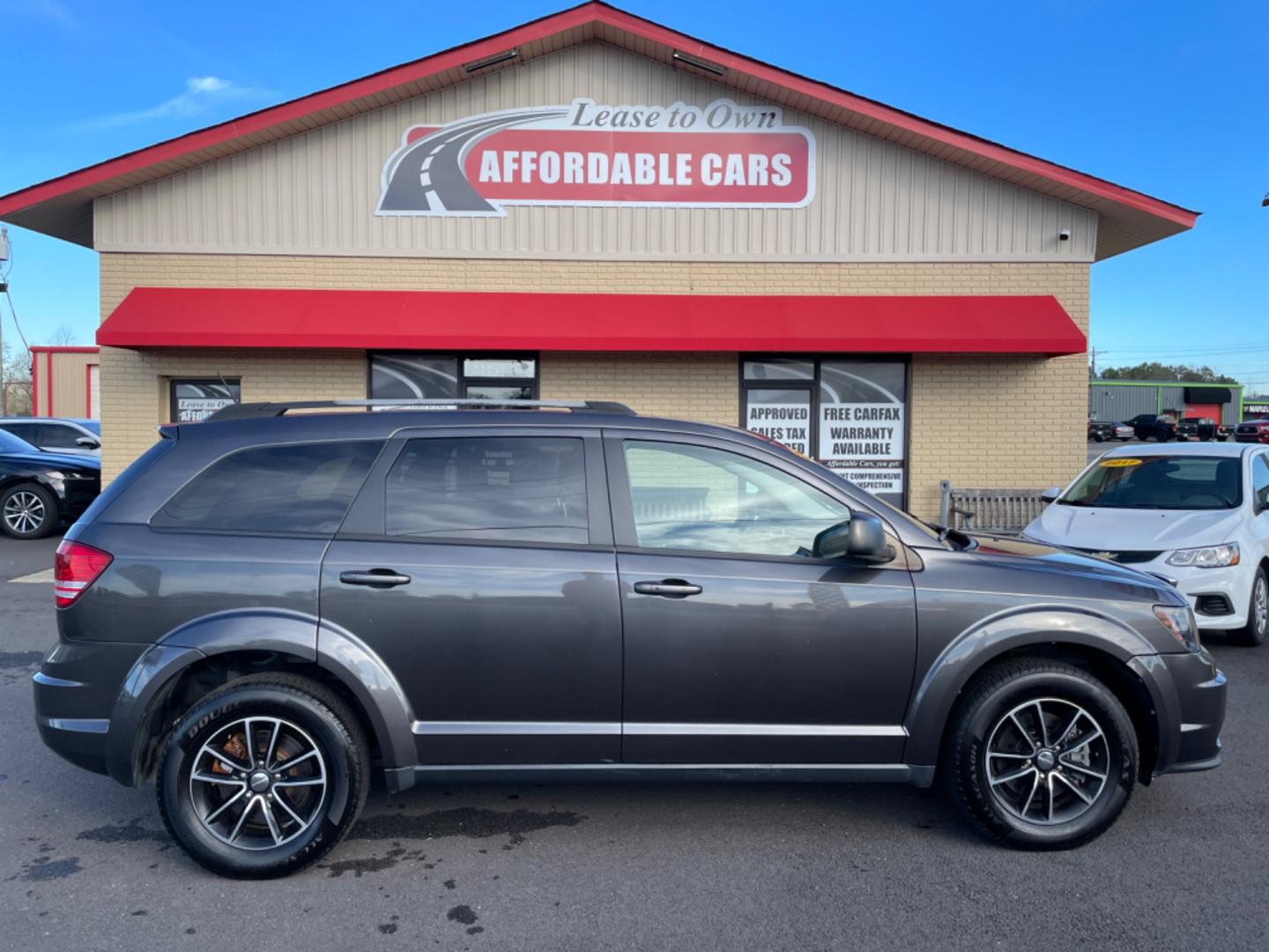 2017 Gray Dodge Journey (3C4PDCAB5HT) with an 4-Cyl, 2.4 Liter engine, Auto, 4-Spd AutoStick transmission, located at 8008 Warden Rd, Sherwood, AR, 72120, (501) 801-6100, 34.830078, -92.186684 - Photo#0